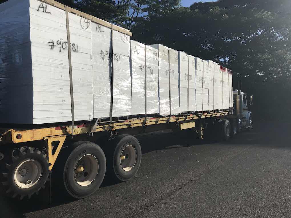 Roofing material procurement and delivery to the job site