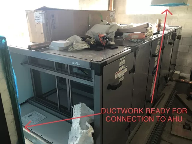 AHU set and ready for connection of ductwork and piping to the unit. 